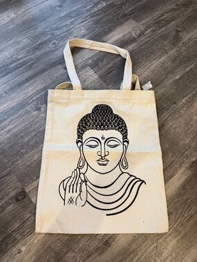 100% cotton canvas tote bag with a printed Lord Buddha design, handmade in Nepal
